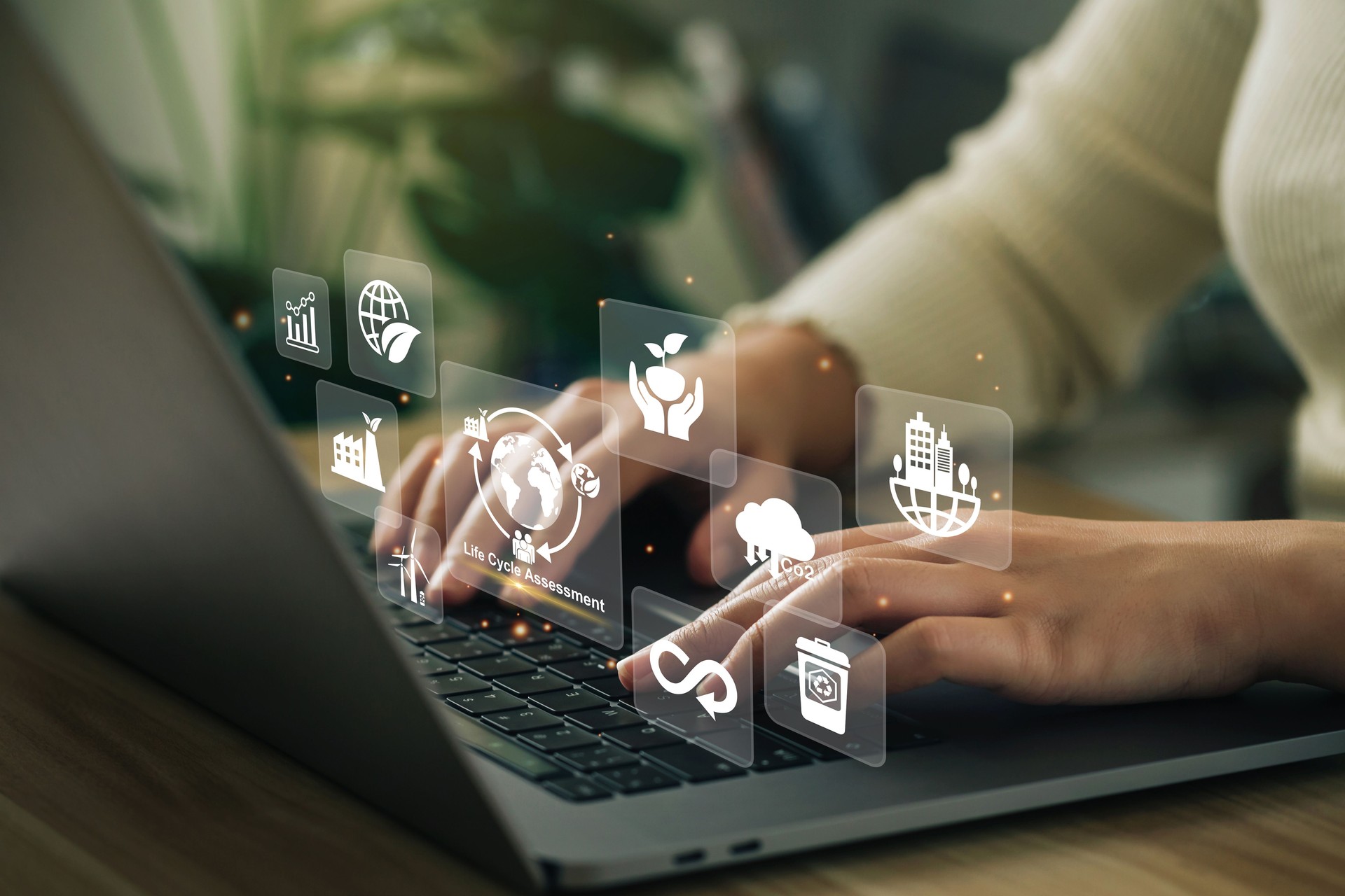 Growing sustainability. LCA-Life cycle assessment concept.Woman using a laptop with LCA icon on virtual screen. environmental impact assessment related to product value chains. ISO LCA standard.